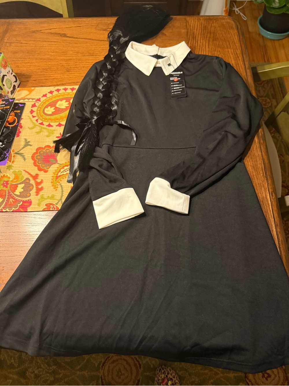 Wednesday Addams Costume. NWT size XL ladies. Includes wig. Never worn.
